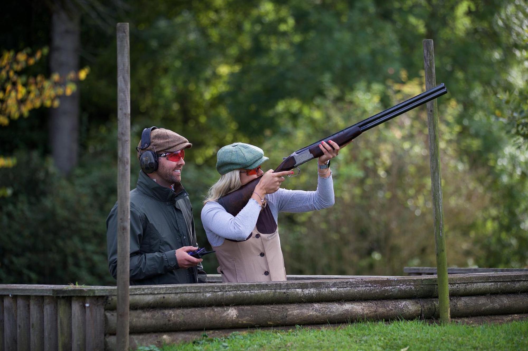 Schloss Roxburghe, Part Of Destination By Hyatt 外观 照片 A woman shooting with a shotgun